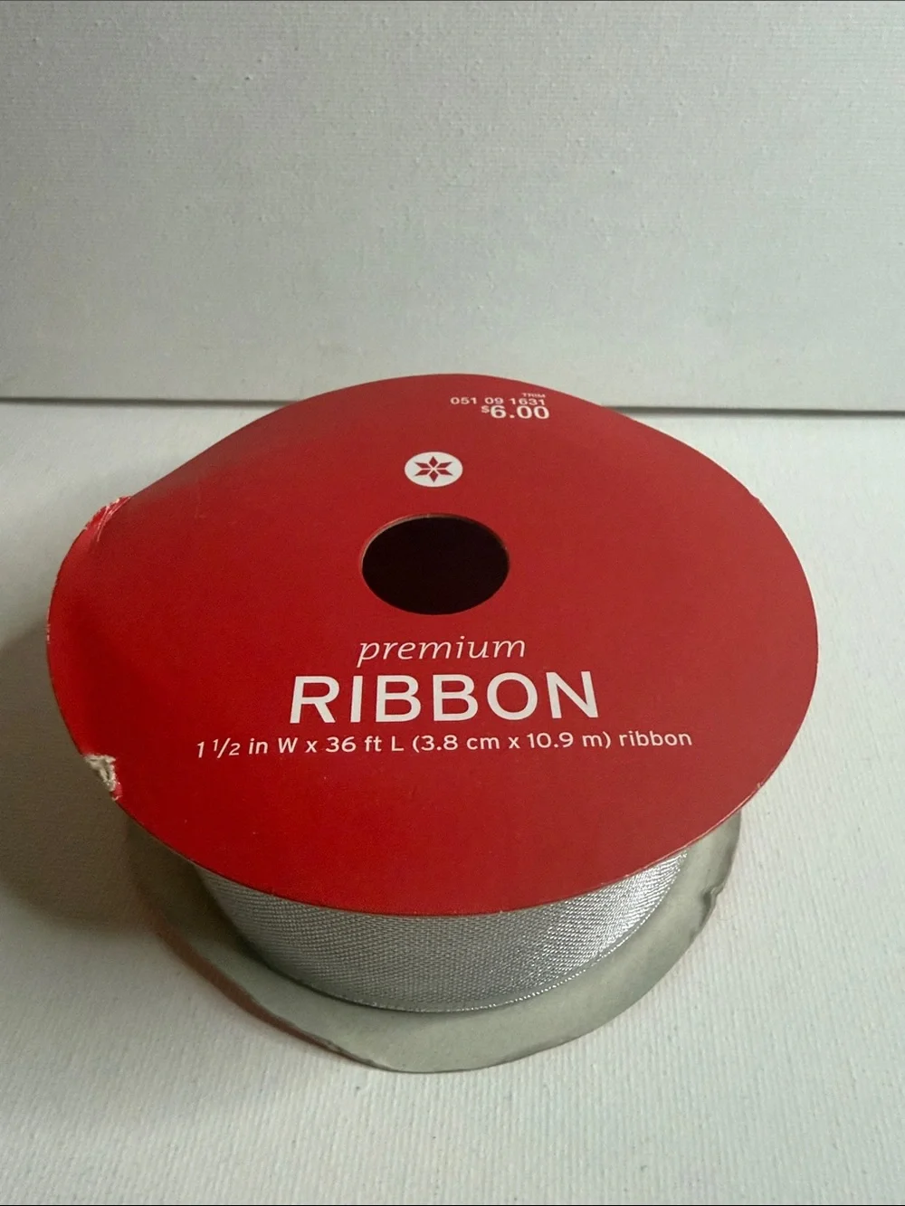 Silver Metallic Ribbon on Red Spool